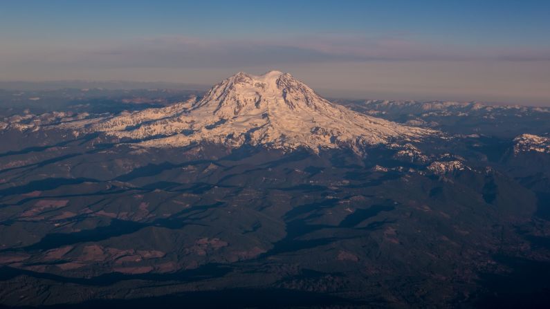 There are Native Americans who want to change the name of Mount Rainier, a dormant volcano southeast of Seattle, back to a Native language name. It's named for a British explorer and naval officer, Admiral Peter Rainier. 