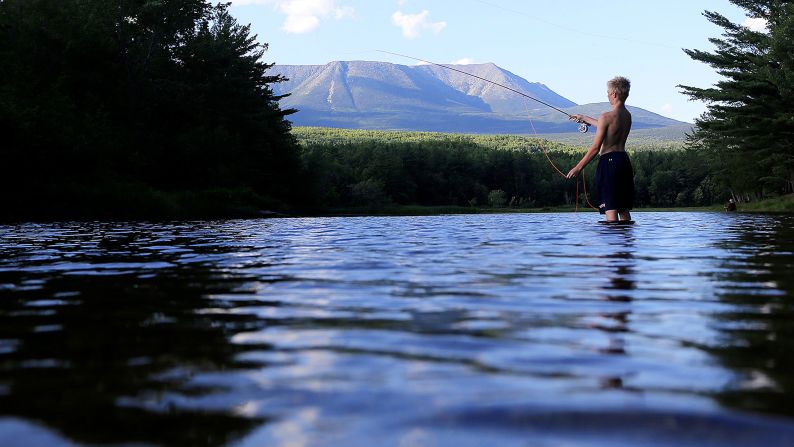 Mount Katahdin looms beyond the West Branch on the Penobscot River near Abol Bridge in Maine. The northernmost point of the Appalachian Trail, the mountain's Penobscot Indian name means "the Greatest Mountain."