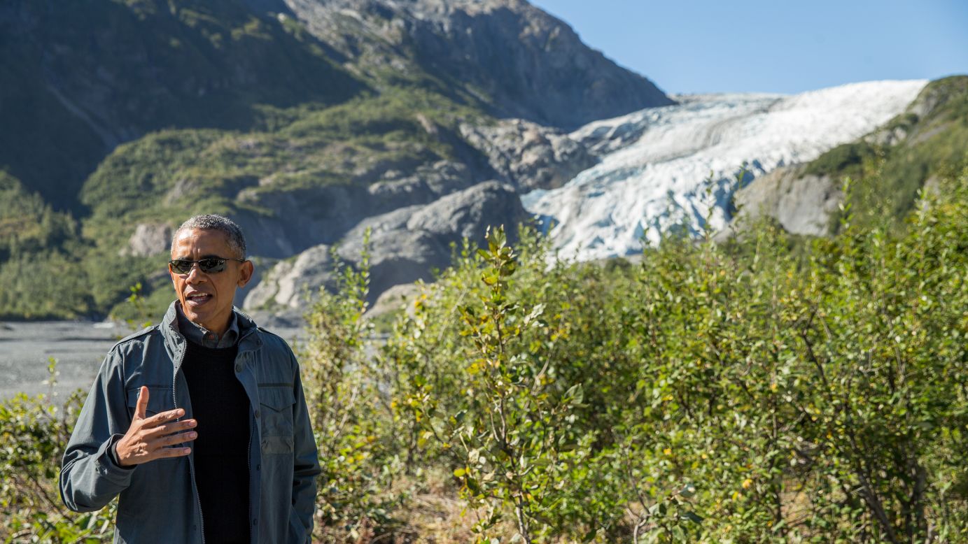 Obama speaks to members of the media while on a hike to the Exit Glacier in Seward on September 1.