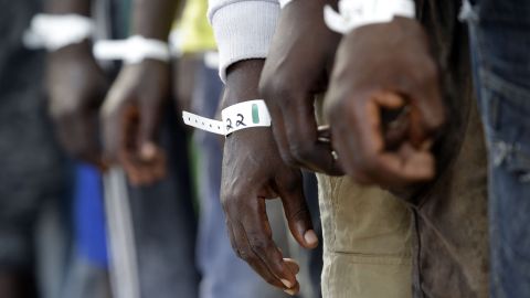 Migrants wear identification bracelets aboard a Norwegian ship during a search-and-rescue mission off the Libyan coast on Tuesday, September 1. Europe is in the midst of a migration crisis. Desperate men and women, often with children in tow, are fleeing wars and poverty to find a better life on the continent. But their voyages, both on land and on sea, can be dangerous and sometimes deadly.
