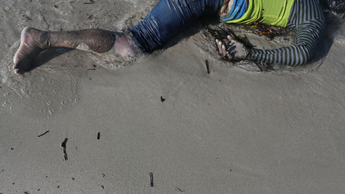 The body of a drowned migrant remains on a shore in Zuwara, Libya. <a href="http://www.cnn.com/2015/08/28/europe/migrant-crisis/index.html" target="_blank">In the last week</a>, two boats carrying hundreds of people capsized near Zuwara, killing at least 84, officials said.