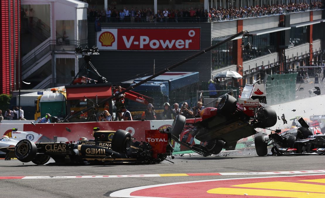 Alonso and Grosjean collide in Belgium.