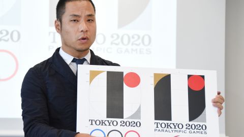 Tokyo Olympic logo designer Kenjiro Sano explains his design during a press conference on August 5, 2015. The designer later withdrew the emblem after a plagiarism controversy.