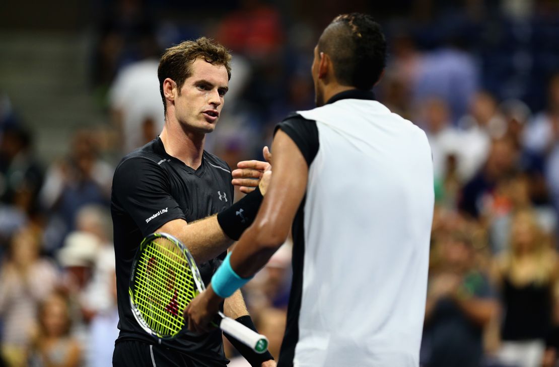 Andy Murray shakes hands at the net after his four-set victory over Nick Kyrgios.