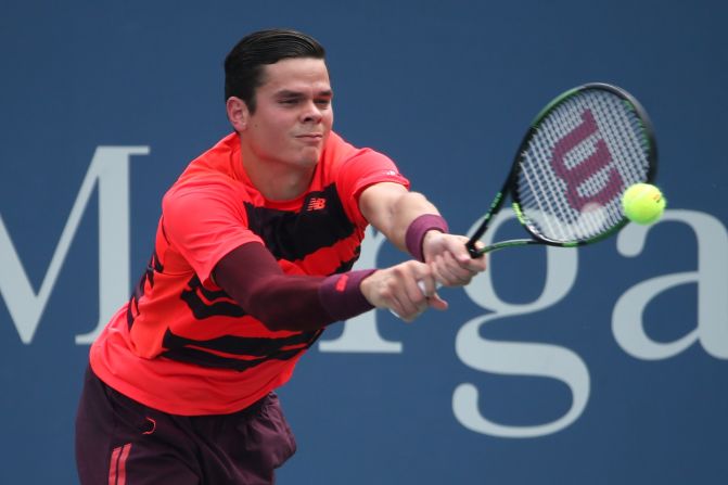 Despite needing treatment for a back injury, 2014 Wimbledon semifinalist Milos Raonic defeated Fernando Verdasco in four sets.