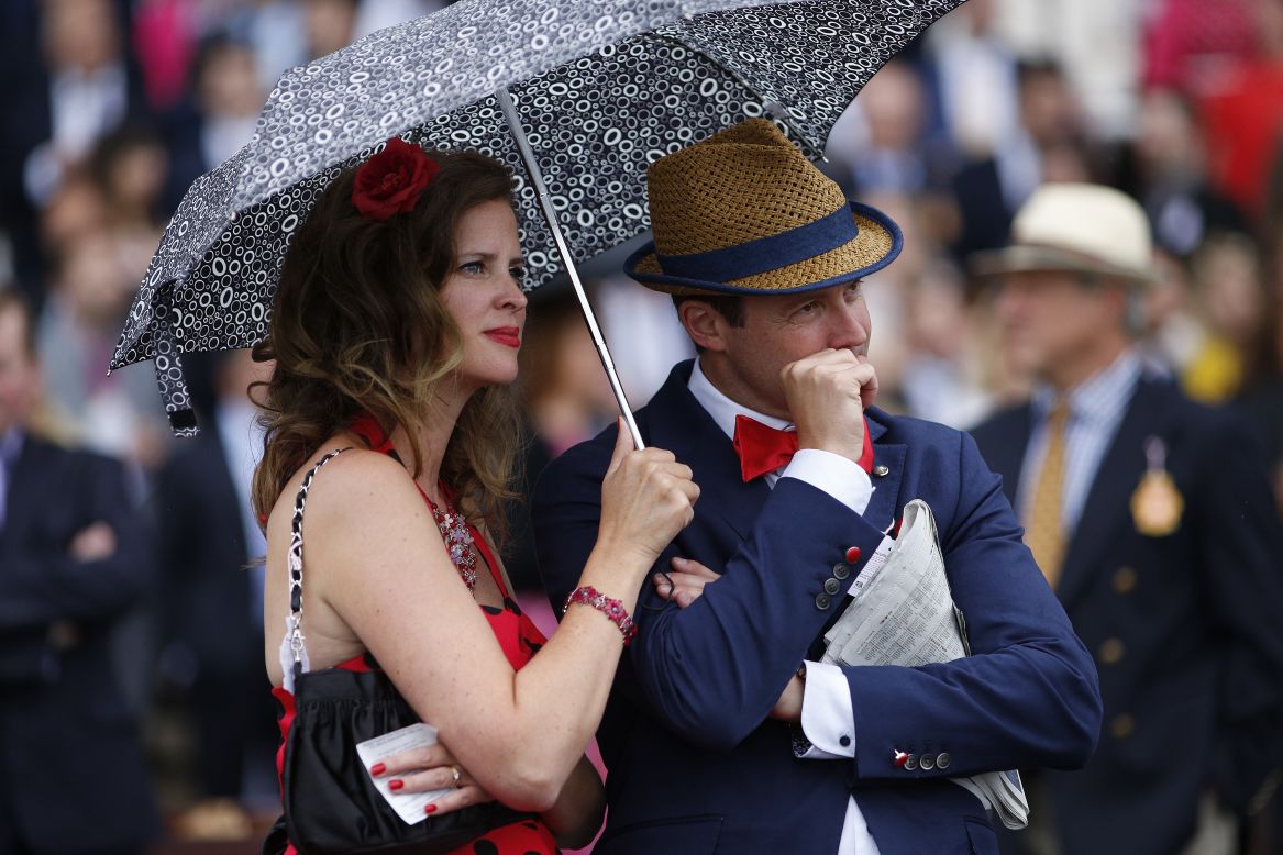 CHICHESTER, ENGLAND - AUGUST 29: A racegoer nervously bites his nails as he watches the action at Goodwood racecourse on August 29, 2015 in Chichester, England. (Photo by Alan Crowhurst/Getty Images)