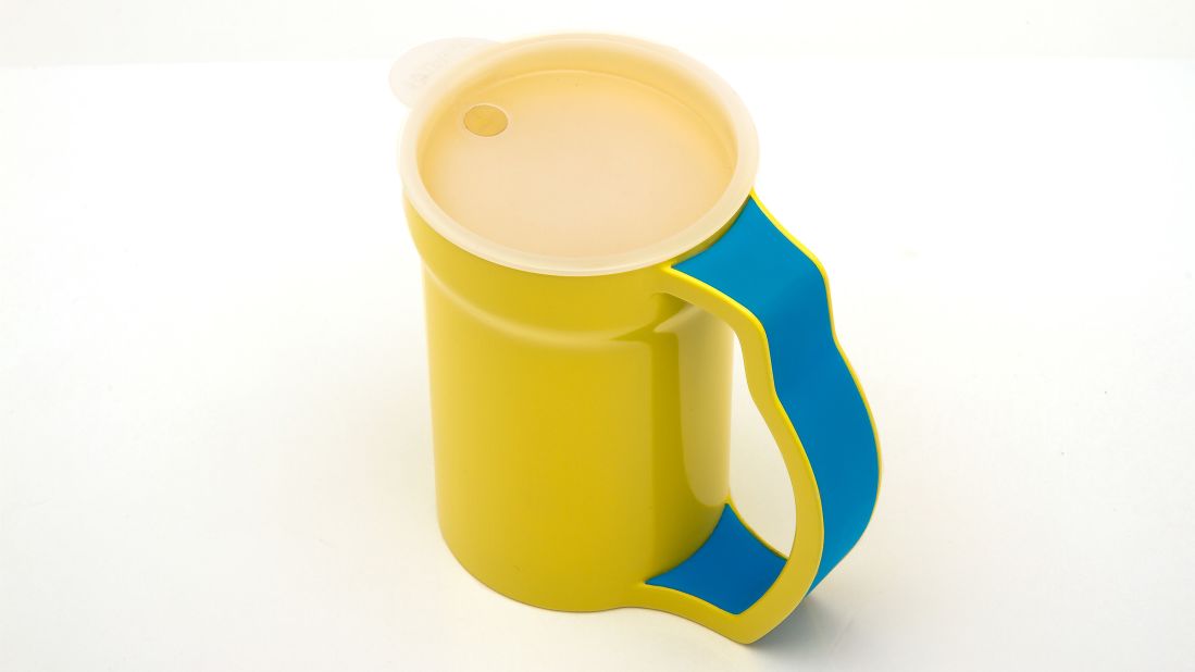 The yellow handled cup provides additional support, which prevents accidental spills, and is designed for patients with physical limitations, such as arthritis.