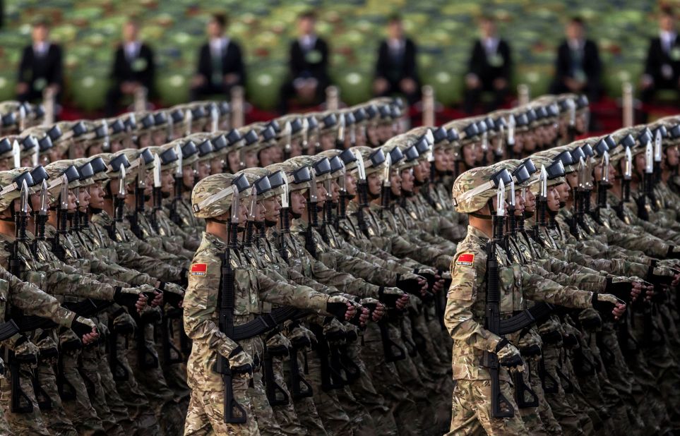 Chinese soldiers march past Tiananmen Square on September 3.