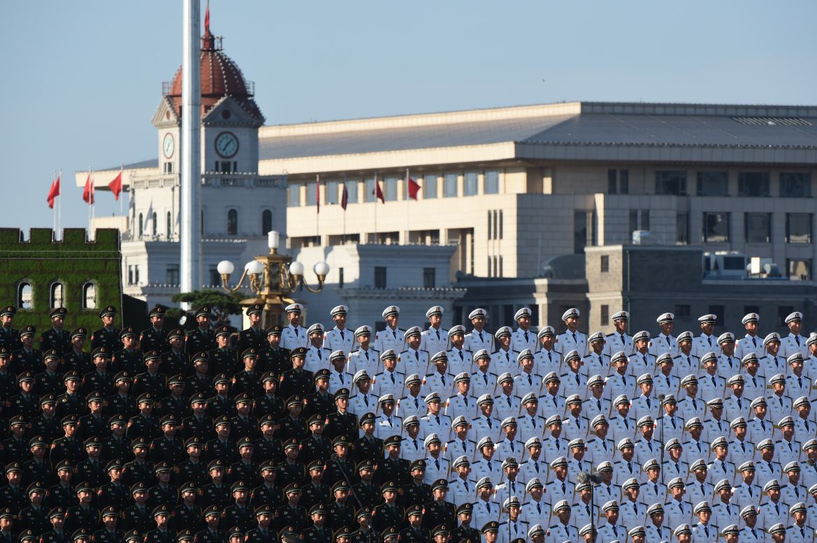 A Chinese military choir stands in position ahead of a military parade at Tiananmen Square in Beijing on September 3.