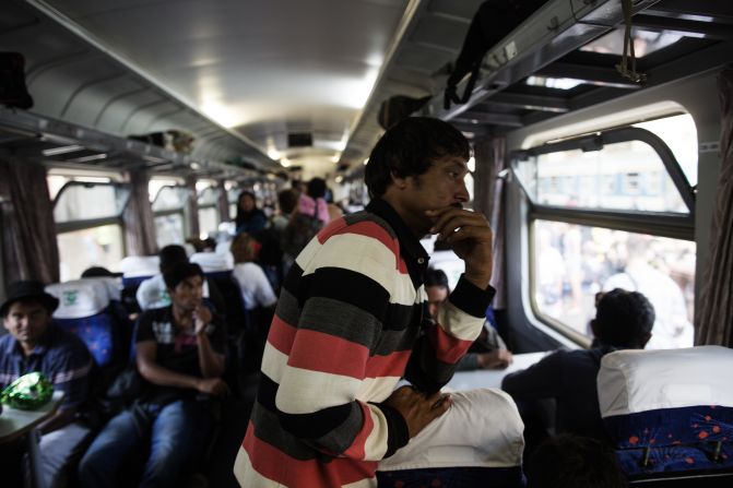 Migrants aboard a train inside the Keleti station.