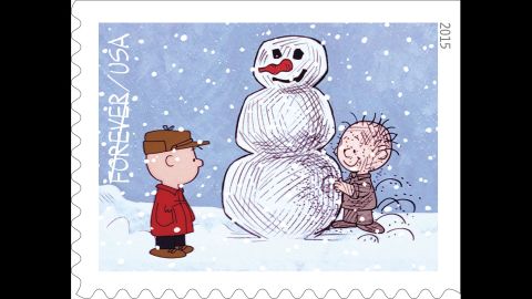 Charlie Brown watches Pigpen, his perpetually dirty classmate, build a snowman. "A Charlie Brown Christmas" first aired on CBS on December 9, 1965.