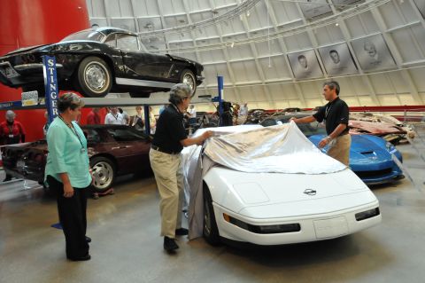 Almost two years after it was swallowed by a sinkhole, the restored 1 millionth Corvette was unveiled at a ceremony Thursday. Angela Lamb, who helped build the car 23 years ago, joined Corvette designer John Cafaro and GM's Dave Bolognino to do the honors. Click through the gallery to see before and after photos of this irreplaceable automotive icon.