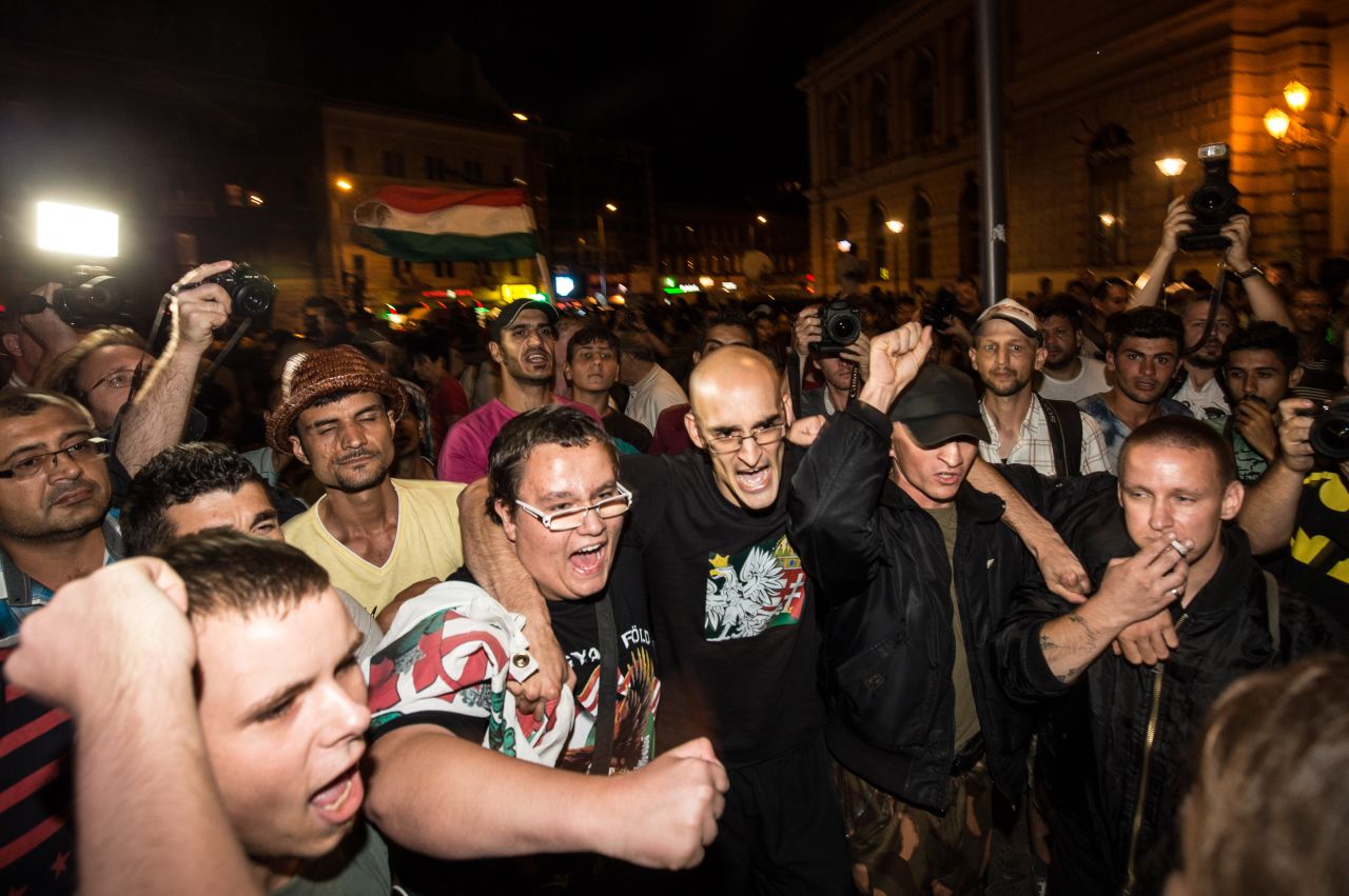 Hungarian nationalists protest as migrants gather in front of Keleti station on September 2.