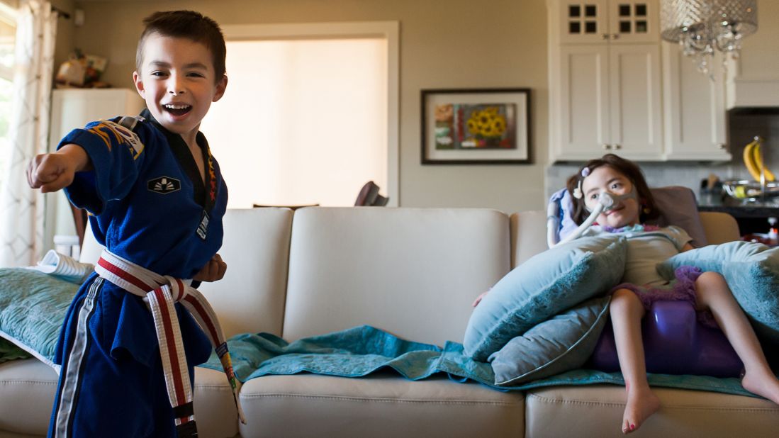 Julianna shows no envy toward Alex, who can race up and down the hallway and do martial arts. 