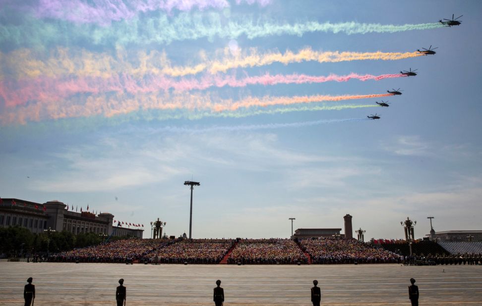 Chinese military helicopters fly in formation over Tiananmen Square on September 3, 2015 in Beijing, China. A massive military parade in Tiananmen Square marked the 70th anniversary of victory over Japan and the end of World War II.