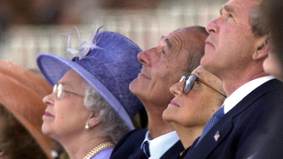 <strong>George W. Bush:</strong> Bush visited Britain on an official state visit in 2003, and the Queen went to the United States in 2007 to celebrate the 400th anniversary of the founding of Jamestown. During his welcome speech, Bush fluffed his lines and said: ''You helped our nation celebrate its bicentennial in 17--. " Realizing his mistake of suggesting the then-81-year-old queen had been on the throne since the 18th century, Bush turned to the monarch and winked at her. Later Bush said she gave him "a look that only a mother could give a child." Here they are pictured in June 2004 watching a flyover in Arromanches, France. It was the 60th anniversary of the D-Day landings.