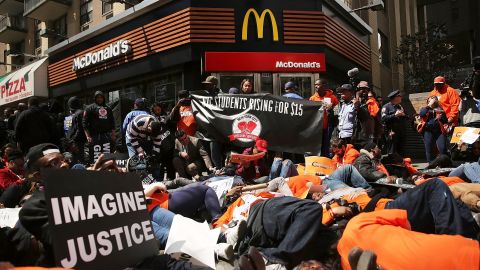 Workers protest at a New York McDonald's in April 2015 to demand a minimum wage of $15 an hour.