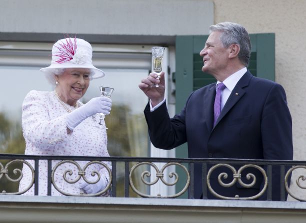 The Queen raises a glass with the President of Germany, Joachim Gauck, as they attend a garden party at the British Embassy residence on a <a href="index.php?page=&url=http%3A%2F%2Fedition.cnn.com%2F2015%2F06%2F23%2Feurope%2Fuk-germany-queen-state-visit%2F">state visit </a>to the country on June 25, 2015 in Berlin. 