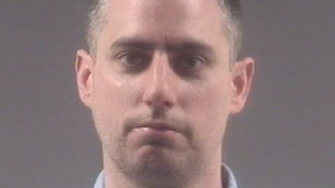 Stephen Rankin -- who was fired Thursday from his job as a Portsmouth, Virginia, police officer -- is charged with first-degree murder and use of a firearm in the commission of a felony.