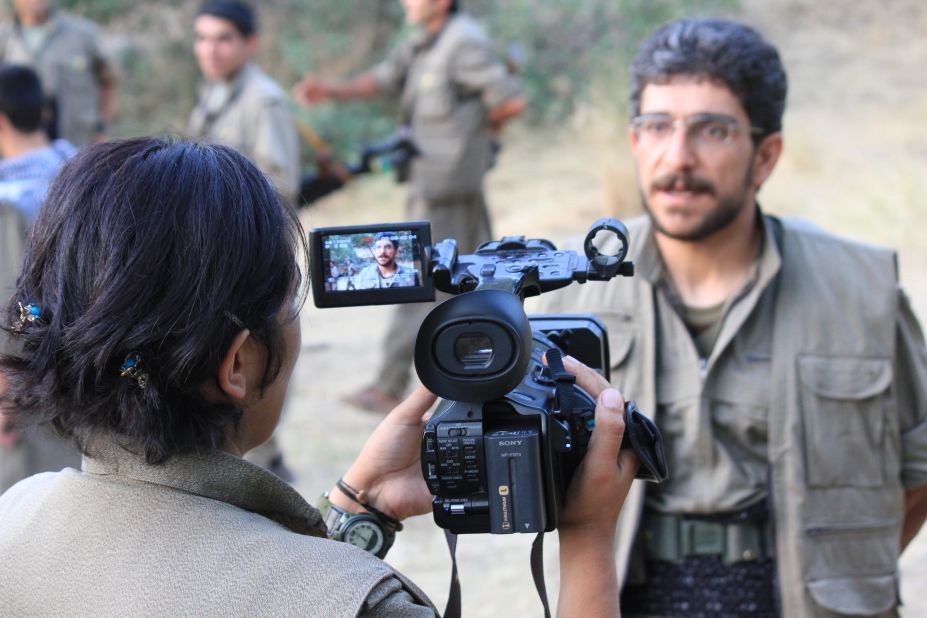 Pictured here speaking to local Kurdish media, Lelikan was sentenced to three years in French jail for participating in the PKK, a Kurdish militant group. But Lelikan denied the charges and fled France, claiming he is a journalist who spent years reporting on the armed movement.