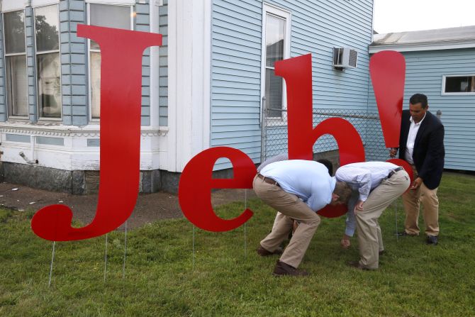  Campaign workers put up letters spelling "Jeb!" outside the site of a campaign town hall meeting with U.S. Republican presidential candidate Jeb Bush at the VFW post in Laconia, New Hampshire, on Wednesday, September 3.  