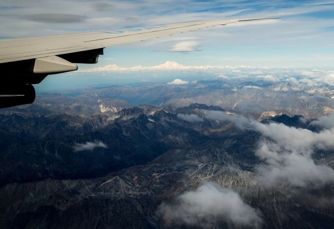 The newly renamed Denali, top center, is seen from a window of Air Force One on approach to Anchorage, Alaska, on Monday, August 31. <a href="http://www.cnn.com/2015/08/30/politics/obama-alaska-denali-climate-change/" target="_blank">President Barack Obama changed the name of America's highest mountain from Mount McKinley</a> at the opening of a historic three-day trip to Alaska aimed at showing solidarity with a state often overlooked by Washington. 