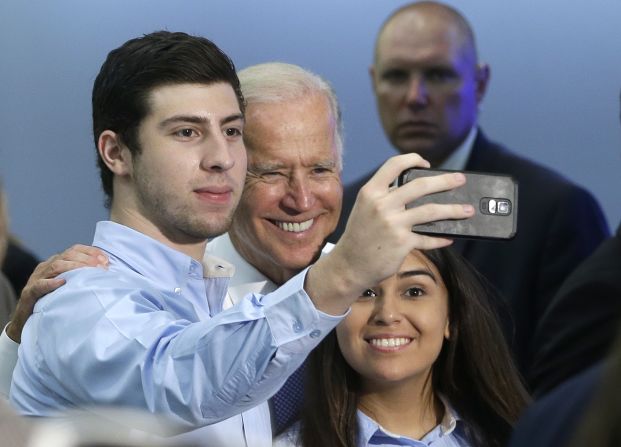 Vice President Joe Biden poses for a selfie with supporters Wednesday, September 2, at Miami Dade College in Miami. Vice President Biden traveled to Florida to support Senate Democrats and the administration's education agenda. 