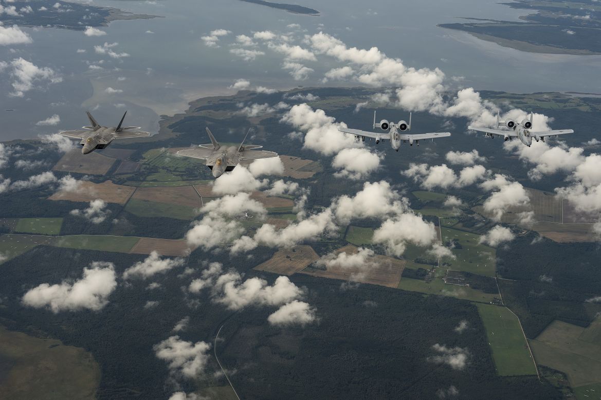 U.S. Air Force F-22 Raptors and A-10 Thunderbolt IIs fly in formation over Tallinn, Estonia, on Friday, September 4. The United States is showing solidarity with a NATO ally as tensions with Russia have escalated in Eastern Europe.