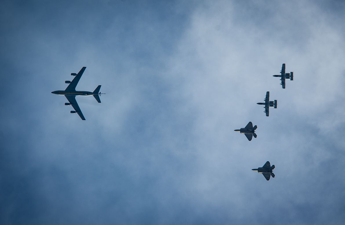 A KC-135 Stratotanker joins two F-22 Raptors and two A-10 Thunderbolt IIs in a flyover before landing at the Amari base on September 4 as part of a brief forward deployment. 