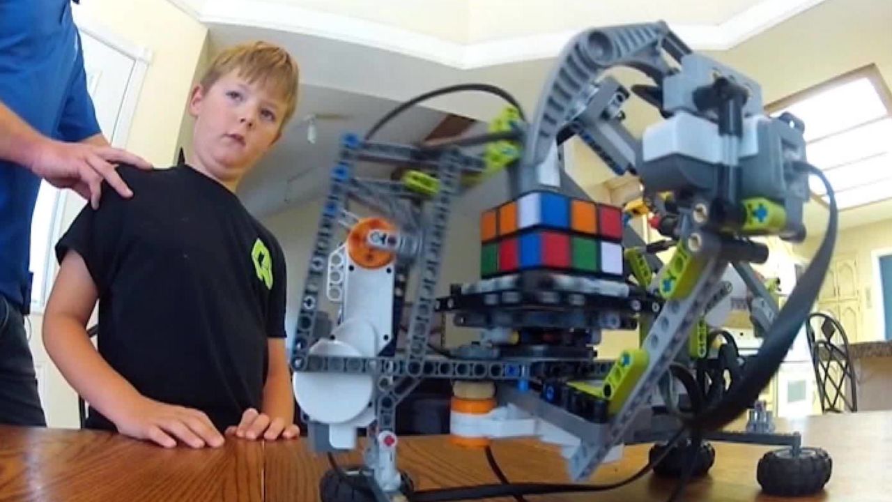 9-year-old builds a Rubik’s Cube solving robot | CNN Business