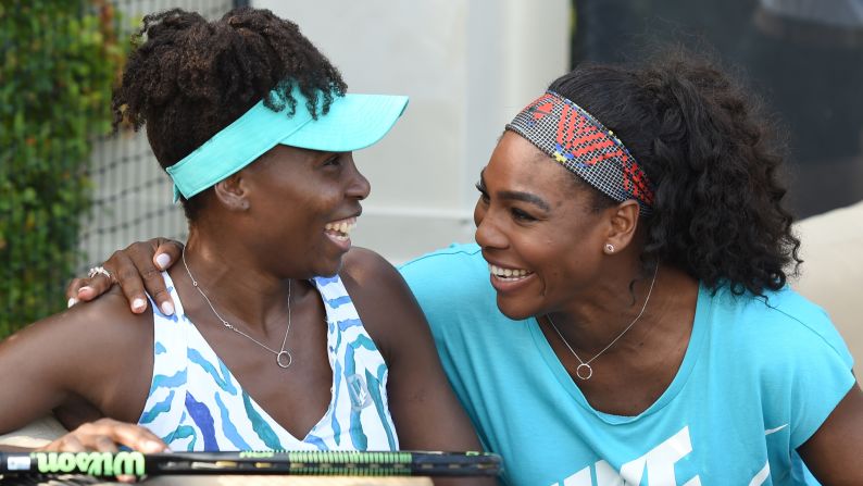 Venus Williams and younger sister Serena Williams will meet in a quarterfinal showdown at the U.S. Open on Tuesday. 
