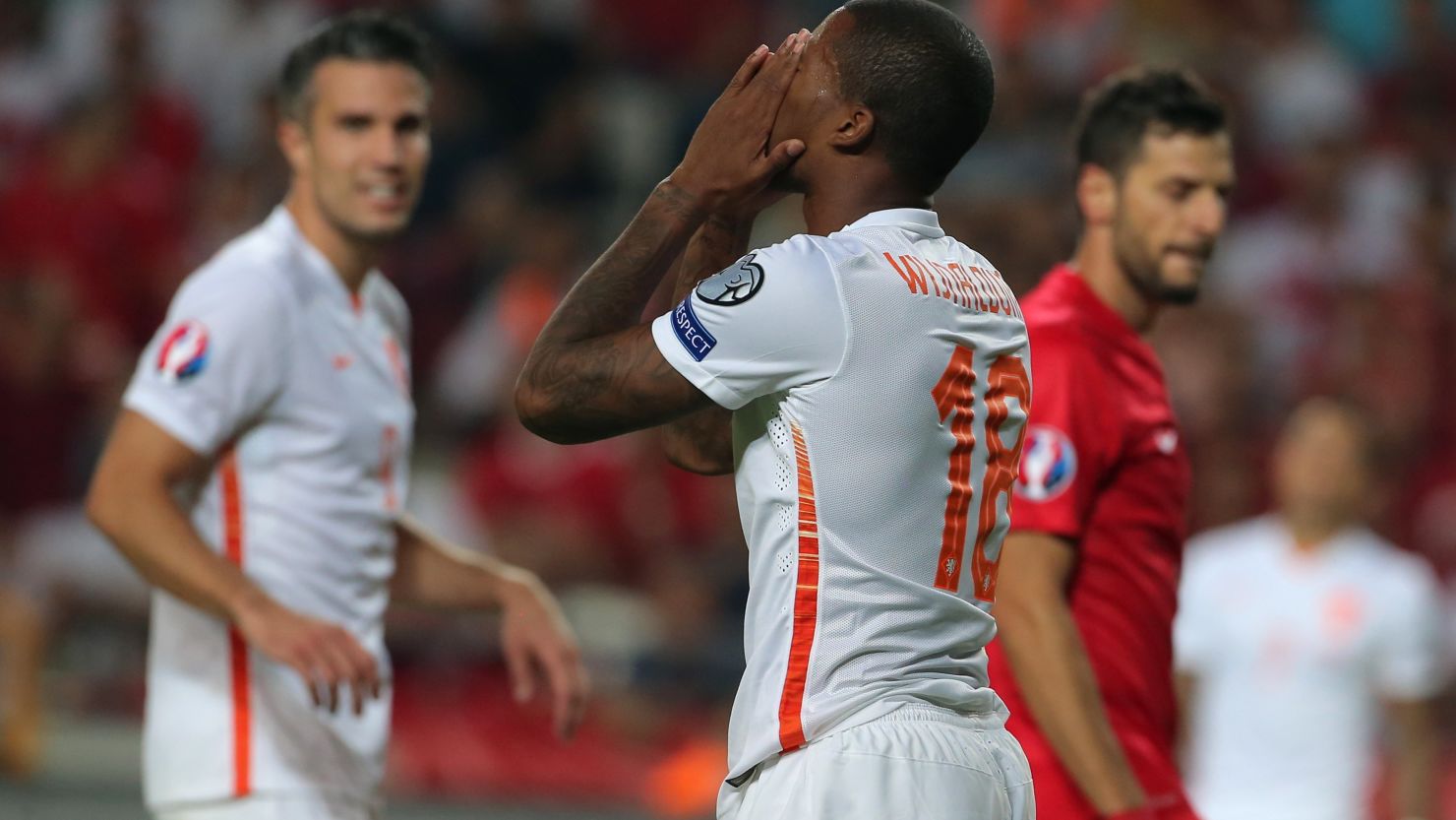 Netherland's Georgino Wijnaldum (C) gestures at the end of the Euro 2016 qualifying match between Turkey and Netherlands at the Arena Stadium in Konya on September 6, 2015. Turkey defeated the Netherlands 3-0.