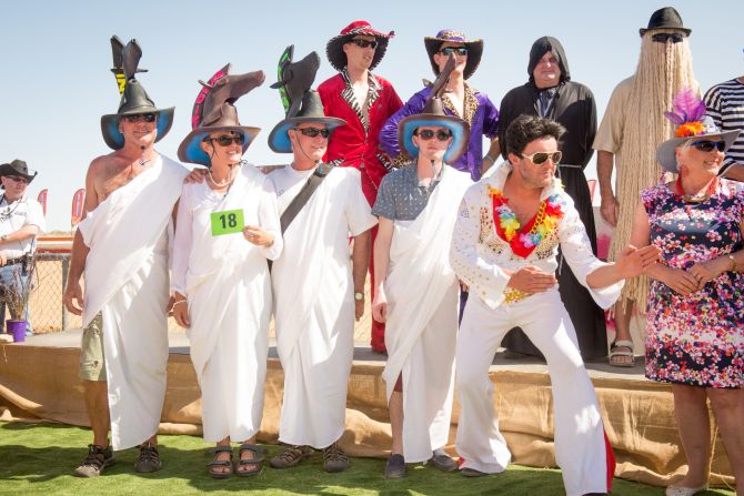 It's not something you'd see at Royal Enclosure at Ascot but Birdsville is a place where Elvis impersonators and men in black trilby hats can really let their hair down.