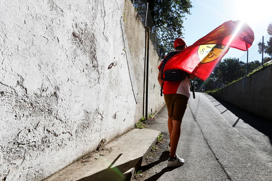  A Ferrari fan arrives at Monza ahead of the Italian Grand Prix. One of the most evocative and important tracks in the sport, it is a highlight of the Formula One season.
