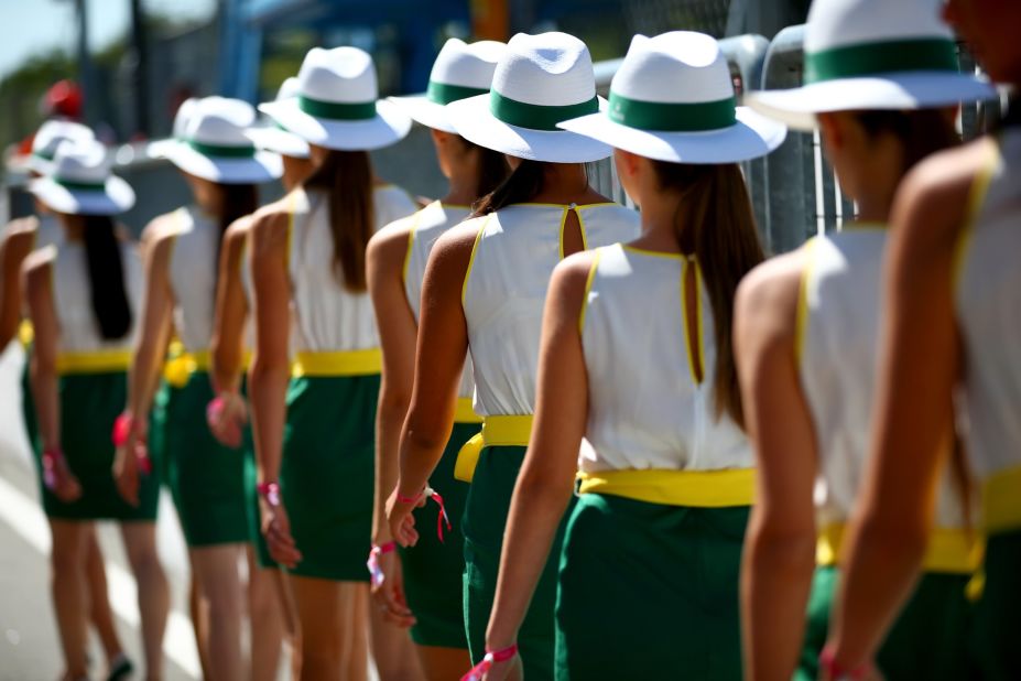 Grid girls -- a permanent feature of every F1 grand prix -- file down to the drivers' parade prior to the start of the race.
