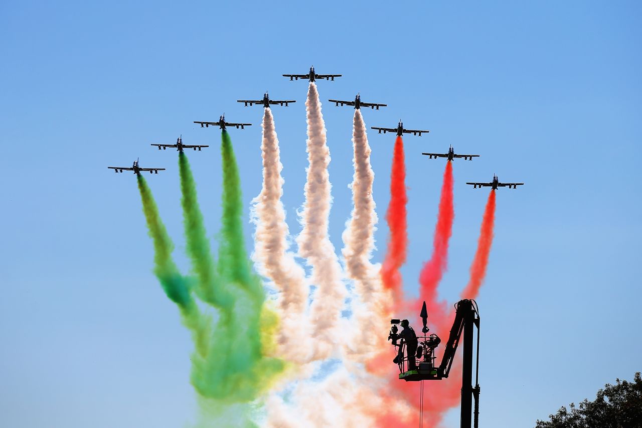 A fly past over Monza spills out smoke in the colors of the Italian flag as the pre-race festivities continued.