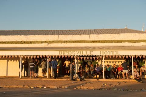 The Birdsville Hotel, which is also the only pub in the town, is the place where locals and racegoers flock to during the weekend. The drinking hole is a popular stop-off point for backpackers from all over the world and probably the most famous Outback bar in Australia. Around 80,000 cans of beer are consumed during the weekend. 