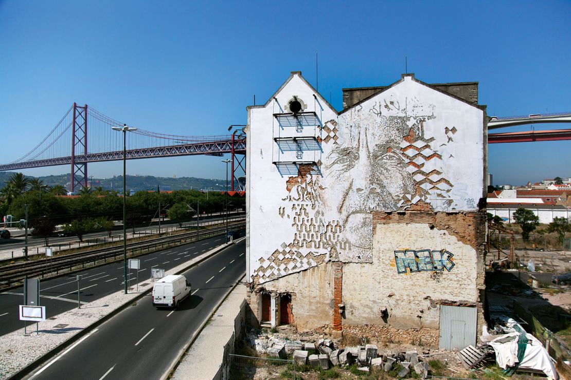 Vhils carved this mural into the side of a building in Lisbon in 2014. 