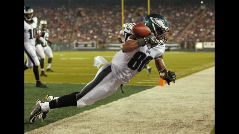 Freddie Martino hauls in a touchdown catch for the Philadelphia Eagles during an NFL preseason game in East Rutherford, New Jersey, on Thursday, September 3.