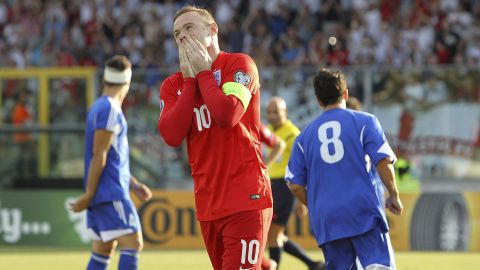 Wayne Rooney reacts after his opening goal against San Marino tied Bobby Charlton's record for most goals scored by an England player. Rooney's 49th international goal helped England claim a 6-0 victory on Saturday, September 5, and the team clinched a spot in next year's European Championship.