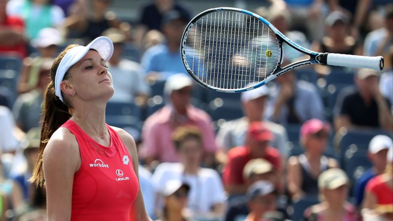 Agnieszka Radwanska flips her racket in the air after losing a point at the U.S. Open on Wednesday, September 2.