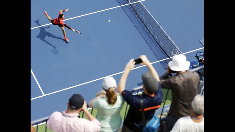 Milos Raonic returns a shot at the U.S. Open on Wednesday, September 2.