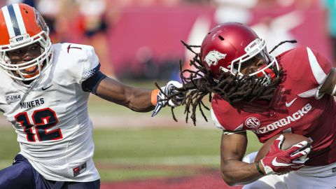 Arkansas' Keon Hatcher is tackled by UTEP's Adrian Hynson during a college football game in Fayetteville, Arkansas, on Saturday, September 5.