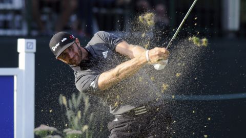 Dustin Johnson hits a tee shot during the first round of the Deutsche Bank Championship on Friday, September 4. The PGA Tour event was played at the TPC of Boston.