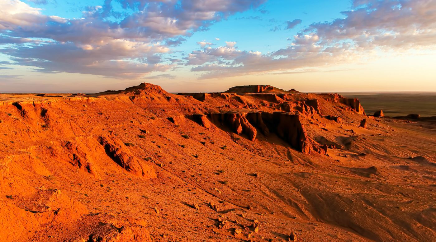 The Flaming Cliffs in South Gobi are famous for one of mankind's most important dinosaur fossils discoveries.<br />While seeing a dinosaur fossil in the wild is a thrilling prospect, the spectacular colors of the sun setting and rising over the sandstones are what make the Flaming Cliffs experience unforgettable.