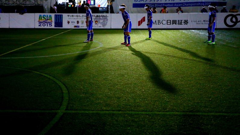 Players from Japan's blind soccer team compete against China during an Asian Championships match in Tokyo on Wednesday, September 2. <a href="index.php?page=&url=http%3A%2F%2Fwww.cnn.com%2F2015%2F09%2F01%2Fsport%2Fgallery%2Fwhat-a-shot-sports-0901%2Findex.html" target="_blank">See 37 amazing sports photos from last week</a>