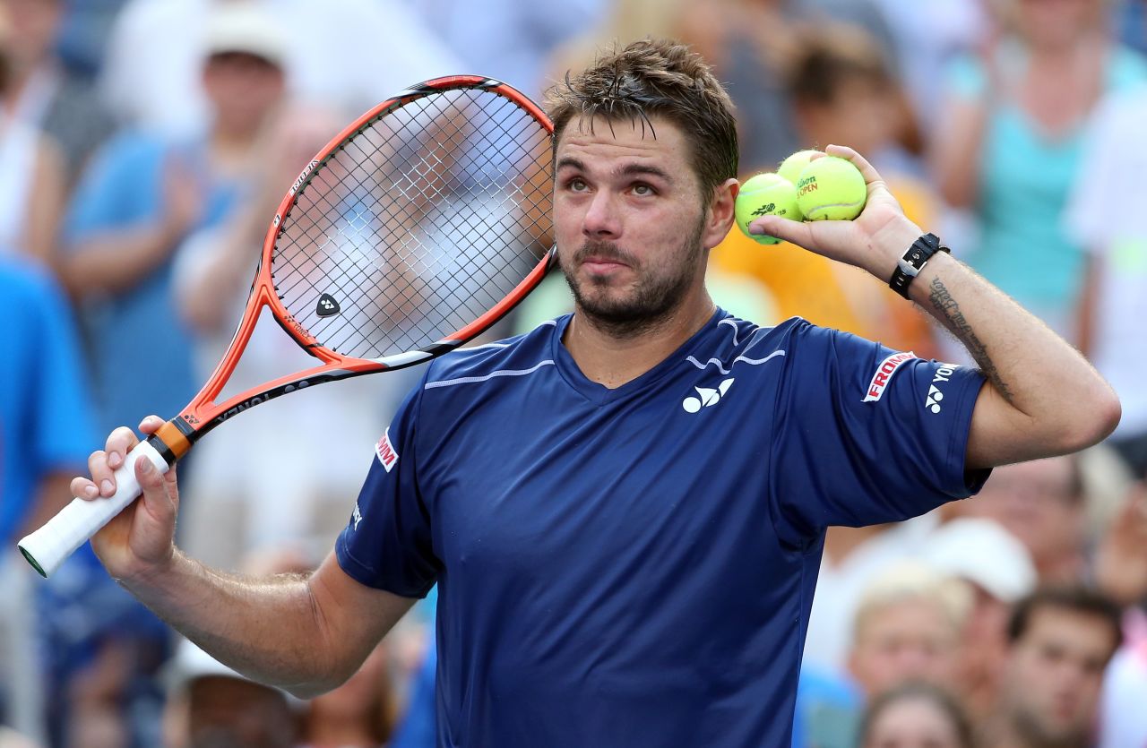 Stan Wawrinka of Switzerland celebrates after defeating Donald Young of the United States during their fourth round match. 
