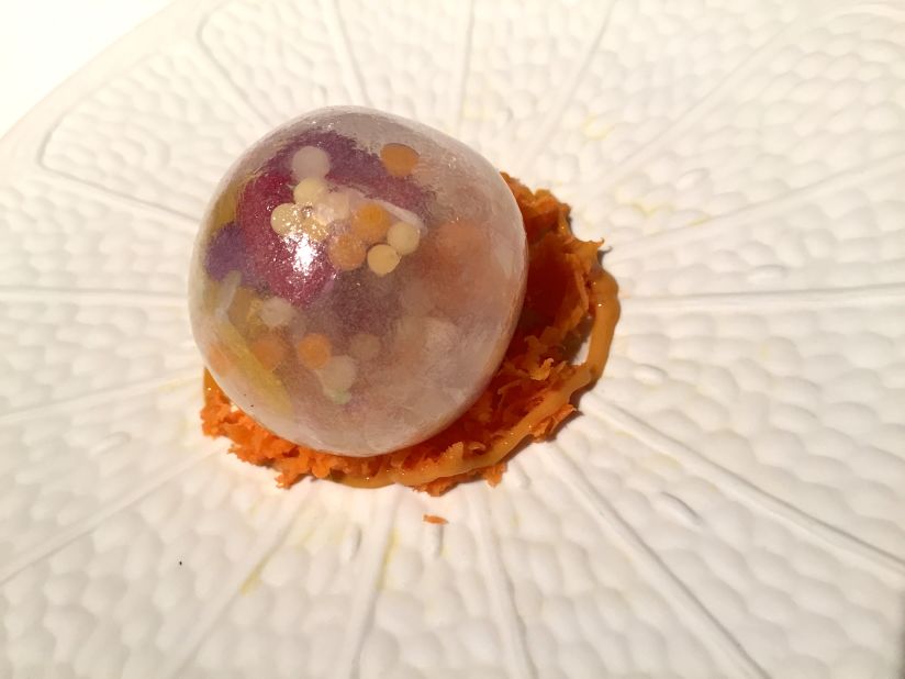 El Celler de Can Roca is famed for masterfully combining amazing flavors with playful elements and artistry. Its Orange Colourology dessert features bits of tangerine, egg yolk, passion fruit and carrot encased in a sugar bowl with a hint of violet.  