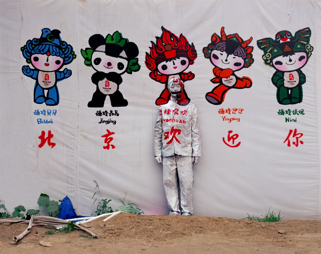In an early work from 2006,  Liu painted himself to match the background of 2008 Beijing Olympics mascots that began appearing throughout the city. Huge swaths of the city's old hutongs were torn down to make way for the event. 