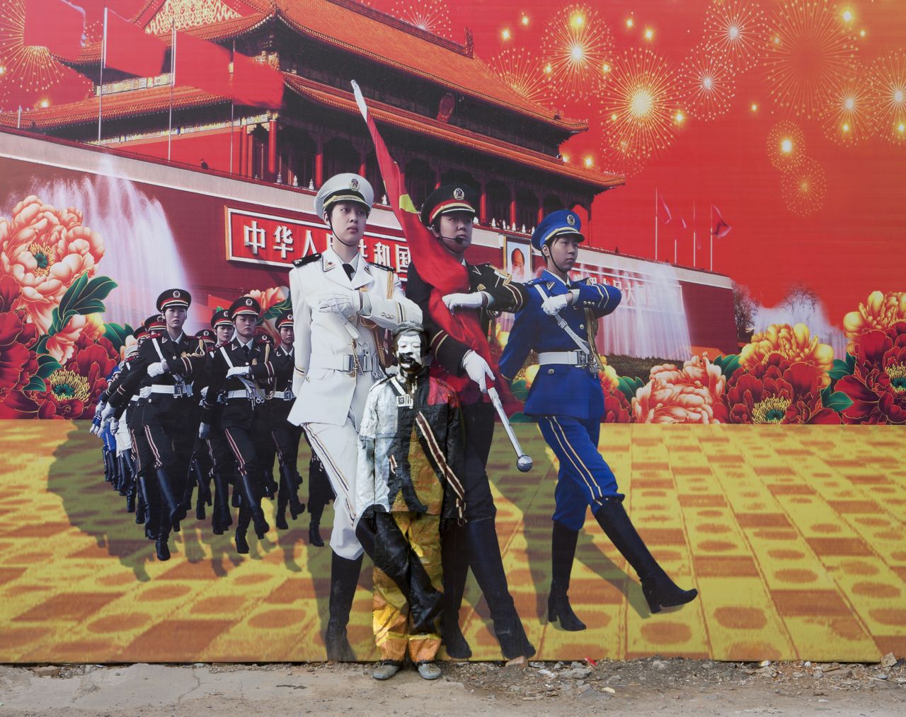 Liu found this blown-up photo depicting China's prosperity and might, on a billboard in the center of the city. "I am trying to dive much deeper into the issues of human development," Liu says, of his evolving body of work.<br />